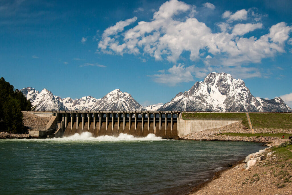 Jackson Lake Dam with beautiful snow capped mountains in the background